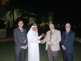 The Mayor Councillor Tony Eden, Councillors Mark Hawkins and David Friend making a presentation to the Chairman of South Hook LNG Company, Sheikh Ali Al Hammadi, on our fact finding visit to Qatar in November.