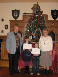 The Mayor Councillor Tony Eden & Mayoress with the Christmas competition winners, Georgina Davies and Kate Barnard